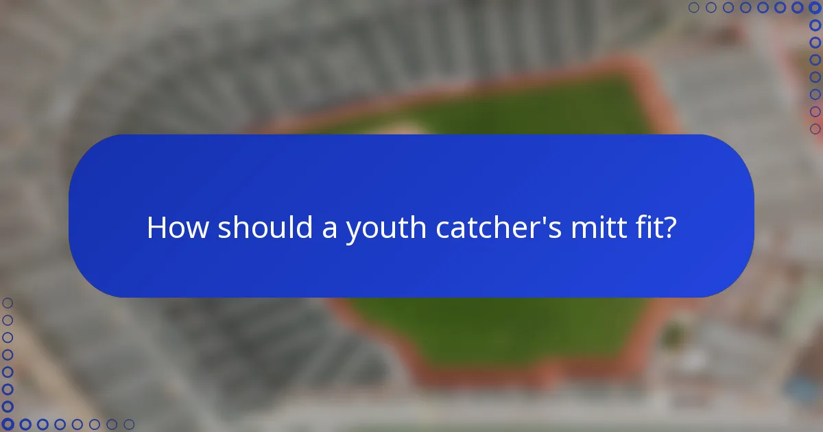 How should a youth catcher's mitt fit?