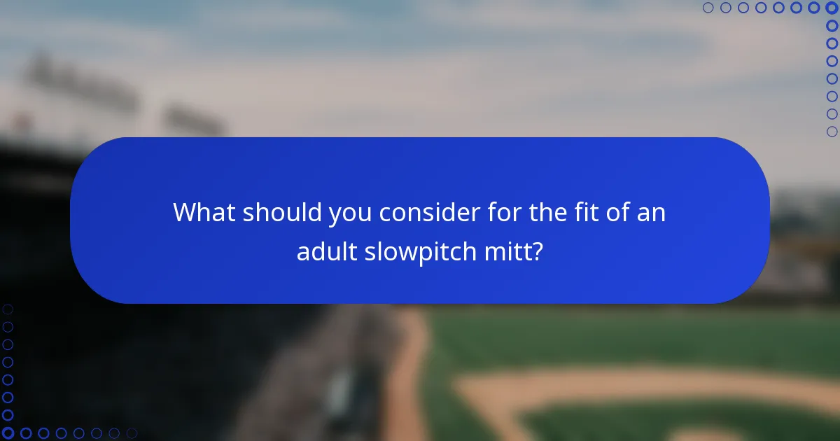 What should you consider for the fit of an adult slowpitch mitt?
